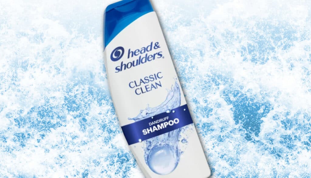 bottle of head & shoulders shampoo on a splashing water background