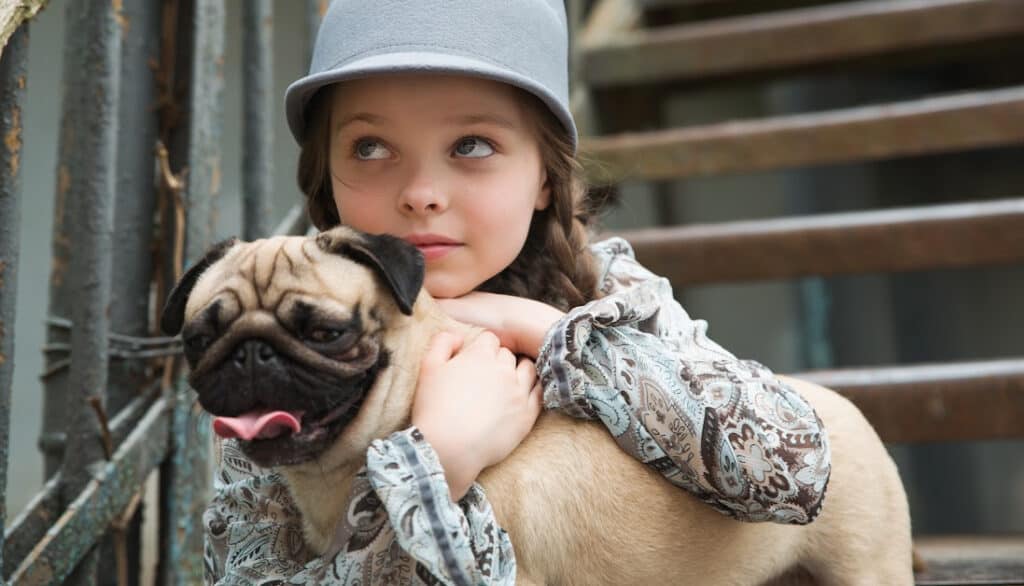 girl with pug